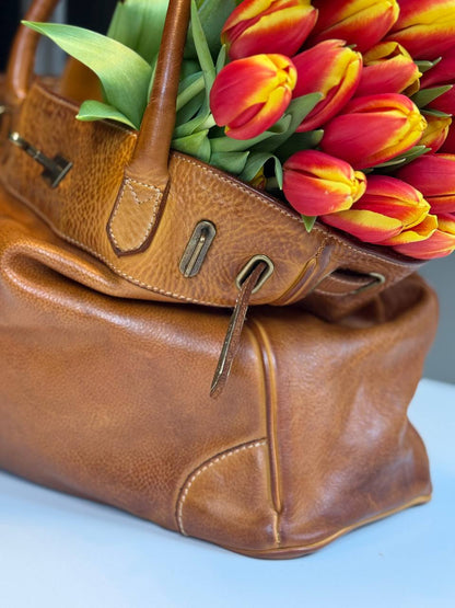 Cognac washed leather bag with handmade finished color