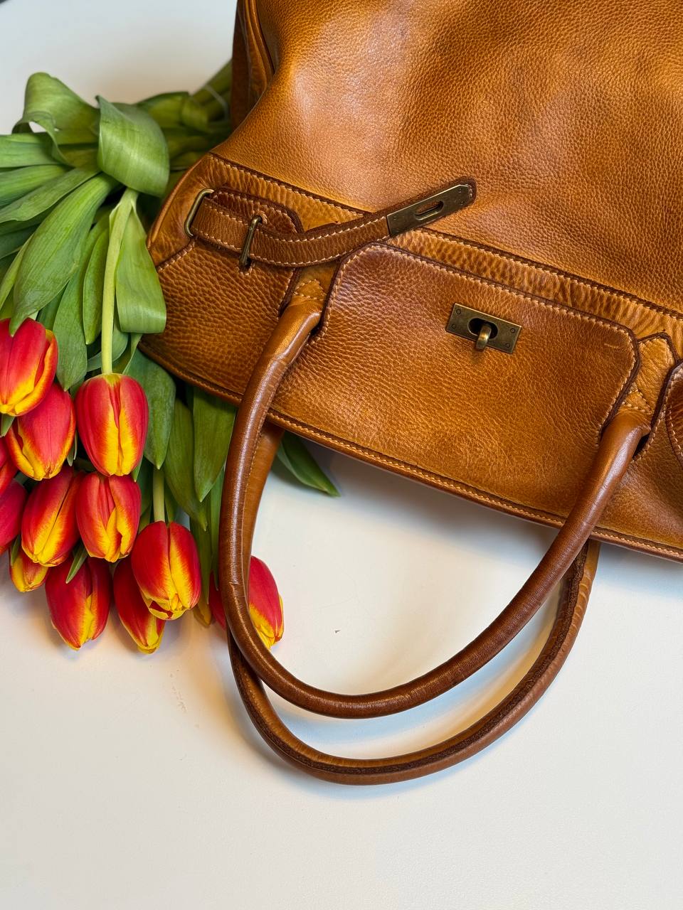 Cognac washed leather bag with handmade finished color