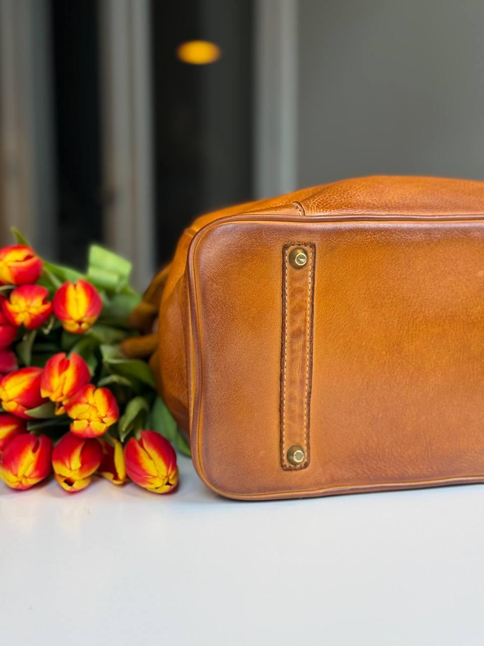 Cognac washed leather bag with handmade finished color