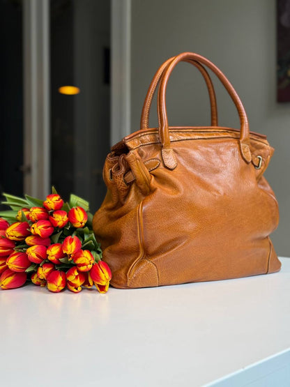 Cognac washed leather bag with handmade finished color
