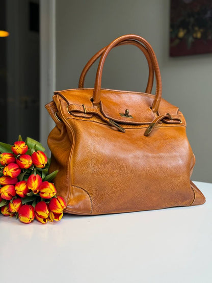 Cognac washed leather bag with handmade finished color