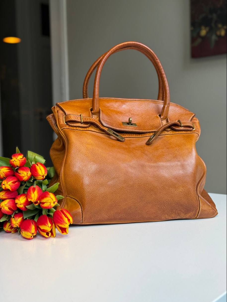 Cognac washed leather bag with handmade finished color