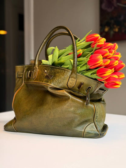 Green washed leather bag with handmade finished color
