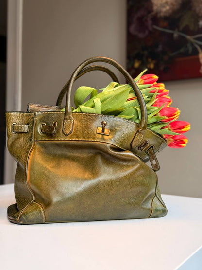 Green washed leather bag with handmade finished color