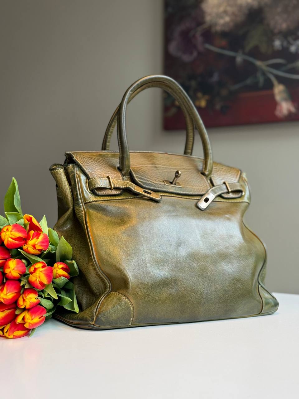 Green washed leather bag with handmade finished color