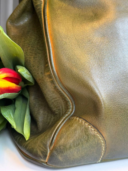 Green washed leather bag with handmade finished color