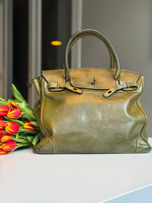 Green washed leather bag with handmade finished color