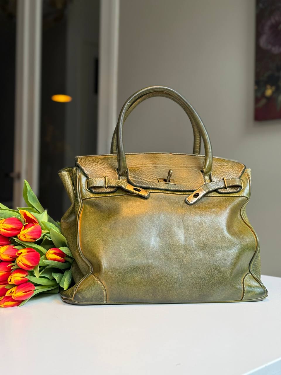 Green washed leather bag with handmade finished color