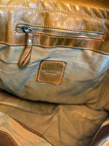 Green washed leather bag with handmade finished color