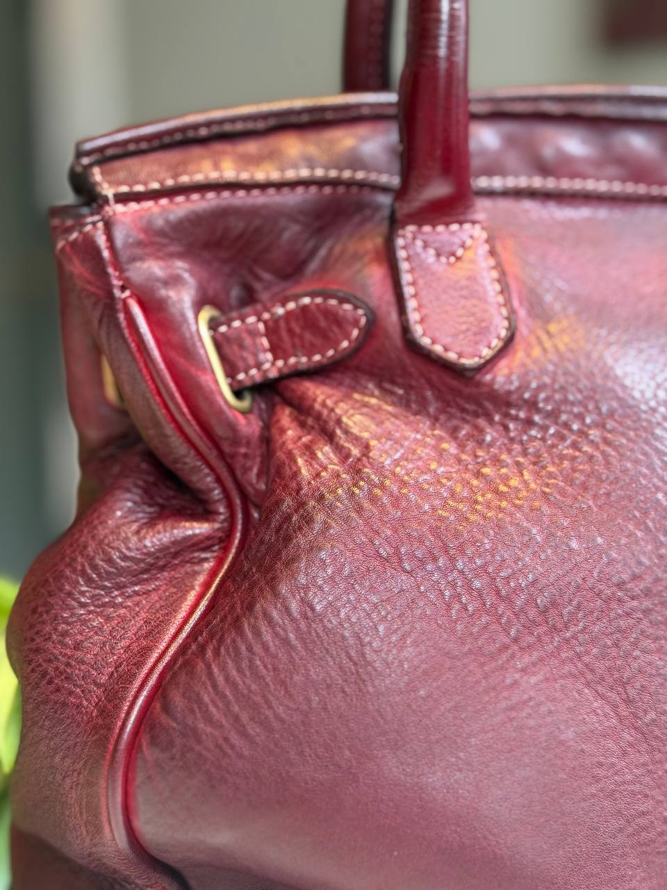Burgundy washed leather bag with handmade finished color
