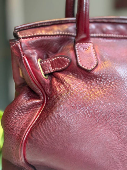 Burgundy washed leather bag with handmade finished color