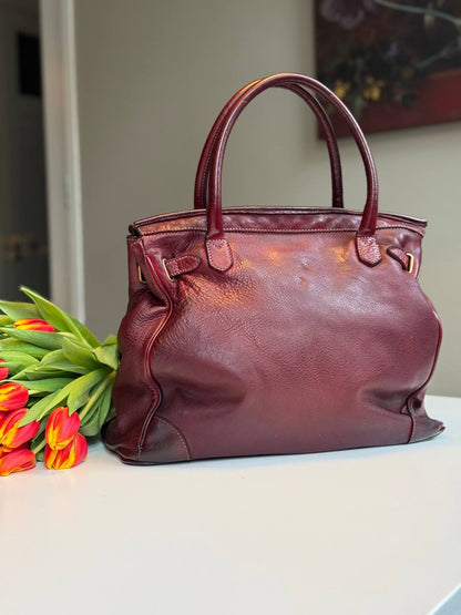Burgundy washed leather bag with handmade finished color