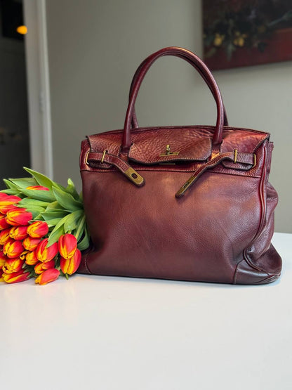 Burgundy washed leather bag with handmade finished color