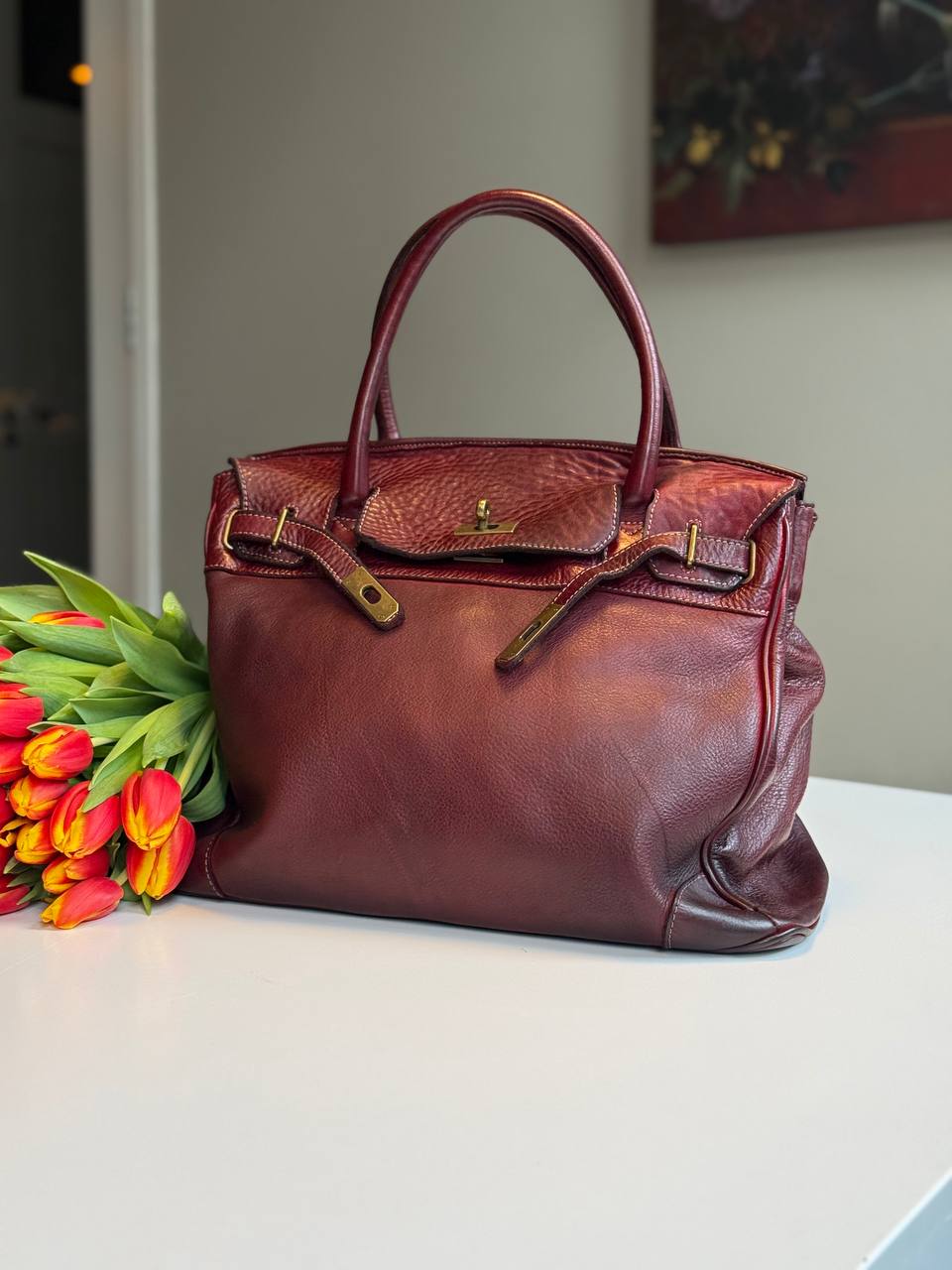 Burgundy washed leather bag with handmade finished color