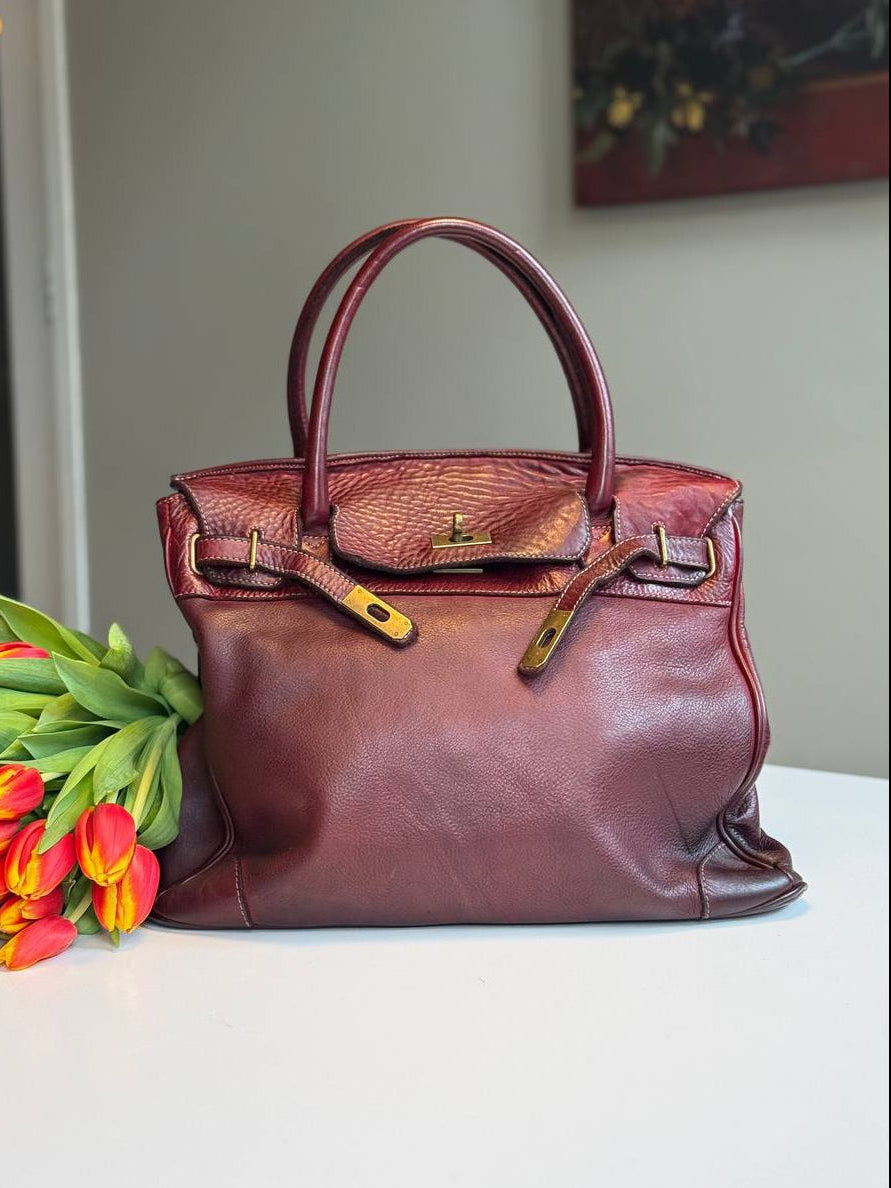 Burgundy washed leather bag with handmade finished color