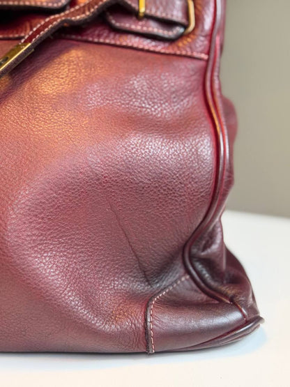 Burgundy washed leather bag with handmade finished color