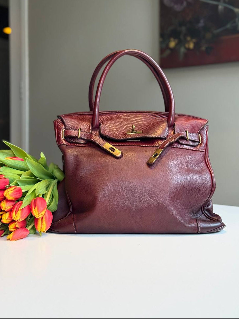 Burgundy washed leather bag with handmade finished color
