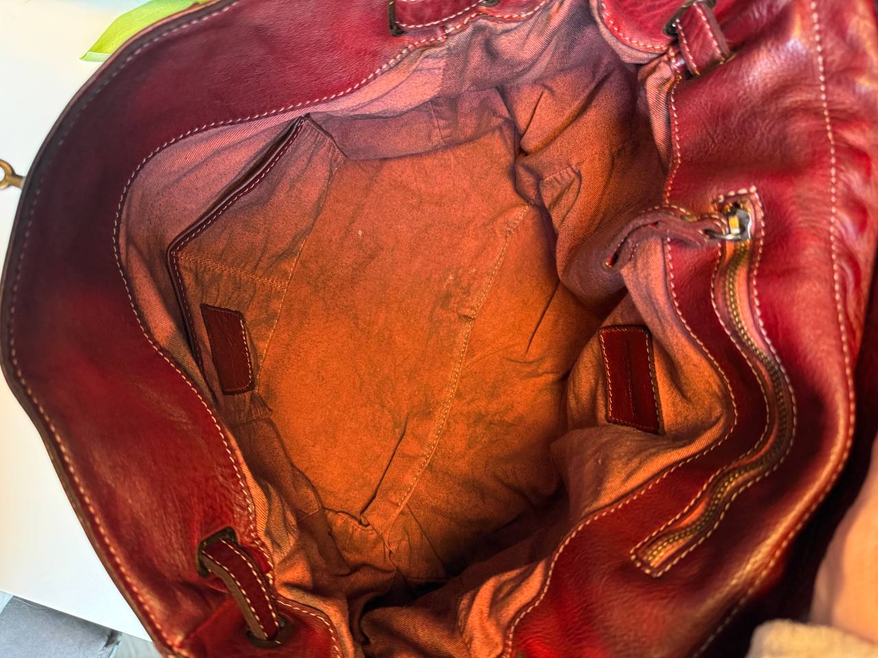 Burgundy washed leather bag with handmade finished color