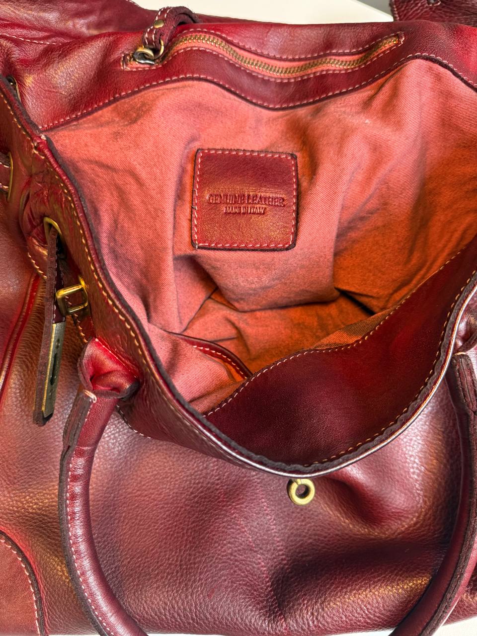Burgundy washed leather bag with handmade finished color