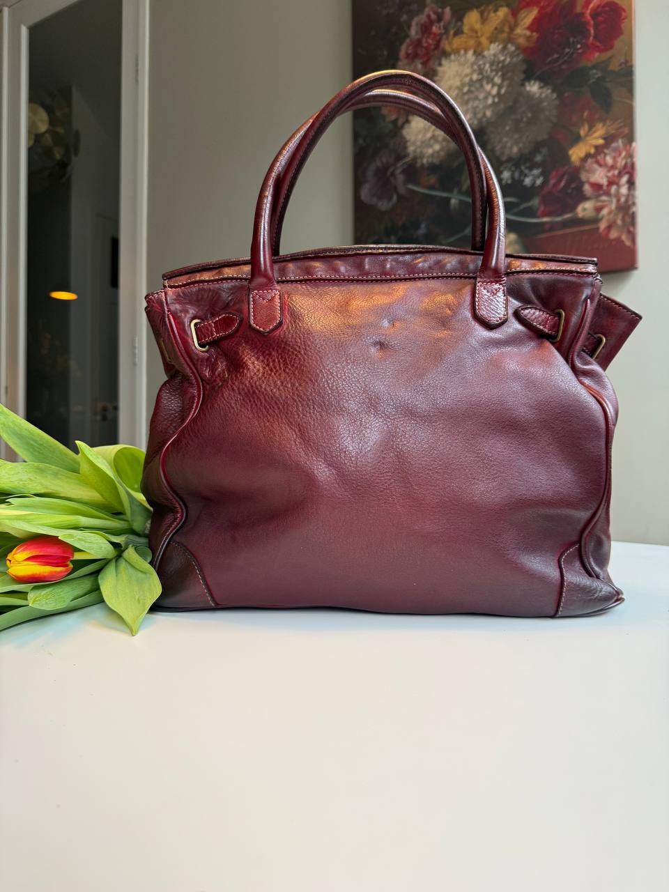 Burgundy washed leather bag with handmade finished color
