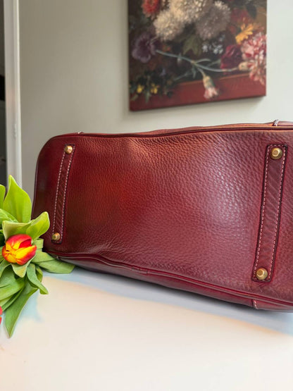 Burgundy washed leather bag with handmade finished color