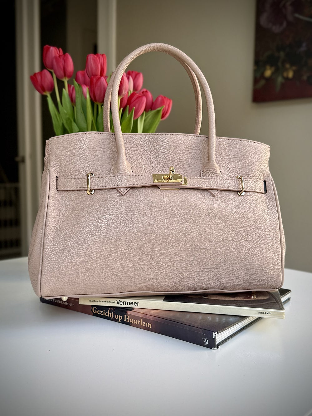 Pink grained leather frame bag